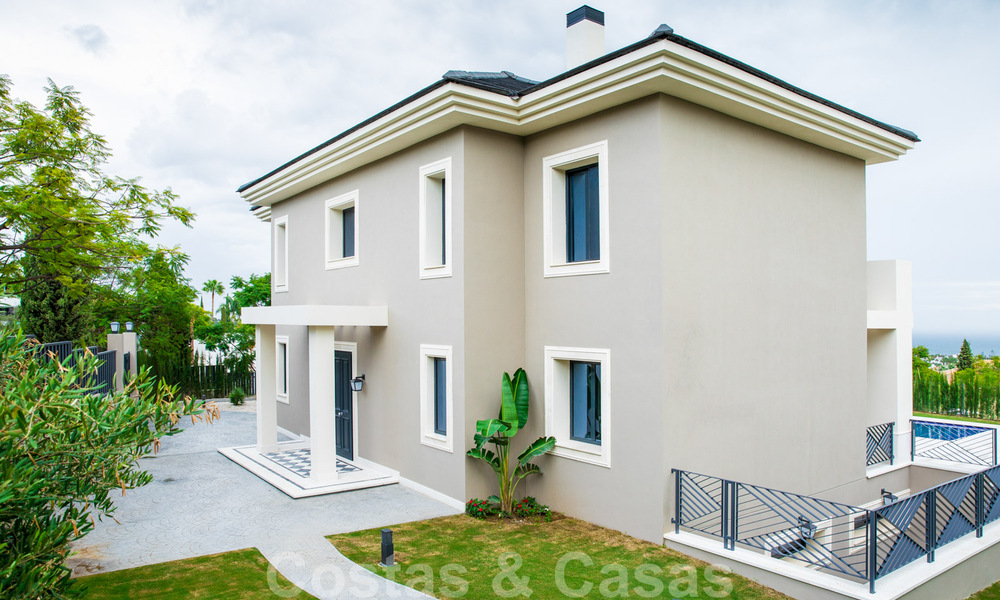 Nieuwbouw villa te koop in een hedendaagse klassieke stijl met zeezicht in vijfsterren golfresort in Marbella - Benahavis 34929