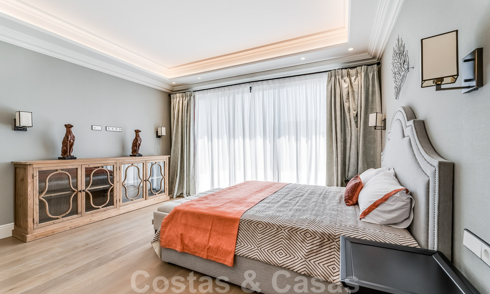 Nieuwbouw villa te koop in een hedendaagse klassieke stijl met zeezicht in vijfsterren golfresort in Marbella - Benahavis 34955