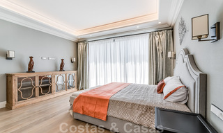 Nieuwbouw villa te koop in een hedendaagse klassieke stijl met zeezicht in vijfsterren golfresort in Marbella - Benahavis 34955 