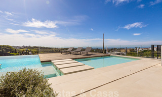 Instapklare, eigentijdse moderne villa te koop met golf- en zeezicht in vijfsterren golfresort in Marbella – Benahavis 35364 