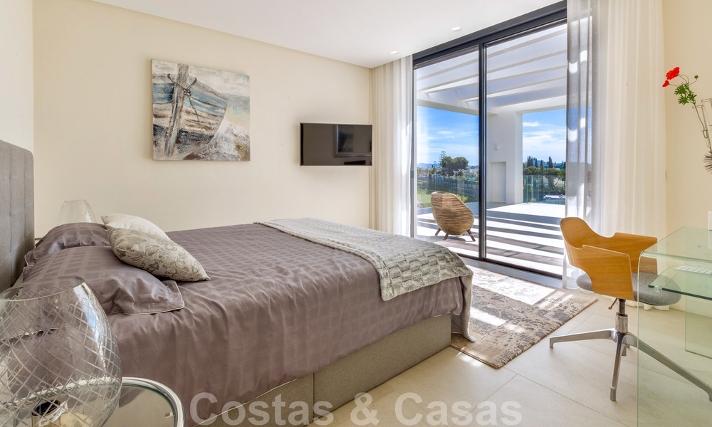 Instapklare, eigentijdse moderne villa te koop met golf- en zeezicht in vijfsterren golfresort in Marbella – Benahavis 35378