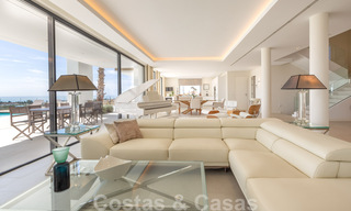 Instapklare, eigentijdse moderne villa te koop met golf- en zeezicht in vijfsterren golfresort in Marbella – Benahavis 35387 