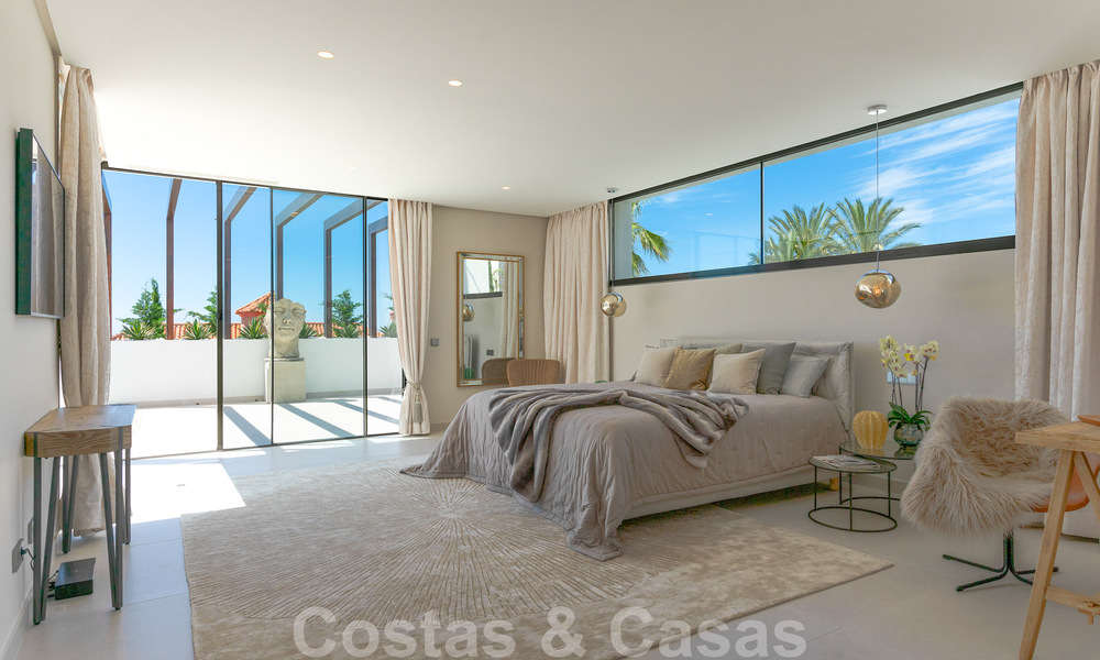 Instapklare, nieuwe moderne villa te koop met zeezicht vanaf ieder niveau in een vijfsterren golfresort in Marbella - Benahavis 35741