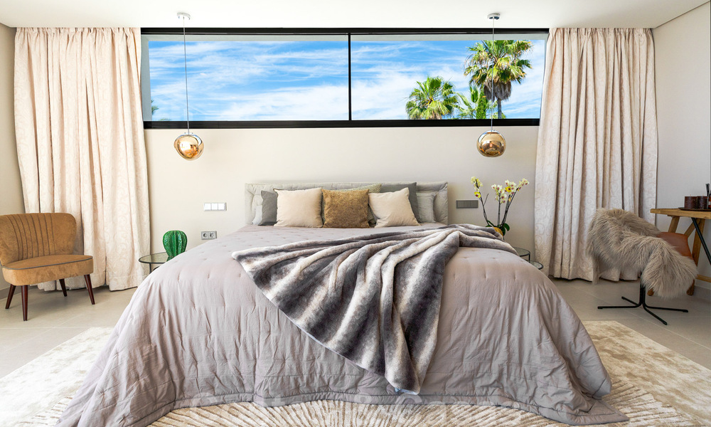 Instapklare, nieuwe moderne villa te koop met zeezicht vanaf ieder niveau in een vijfsterren golfresort in Marbella - Benahavis 35742