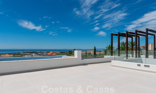 Instapklare, nieuwe moderne villa te koop met zeezicht vanaf ieder niveau in een vijfsterren golfresort in Marbella - Benahavis 35751 