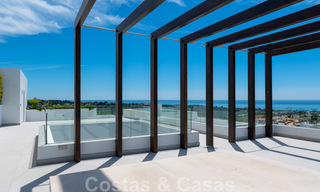 Instapklare, nieuwe moderne villa te koop met zeezicht vanaf ieder niveau in een vijfsterren golfresort in Marbella - Benahavis 35753 