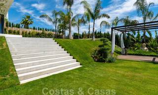 Instapklare, nieuwe moderne villa te koop met zeezicht vanaf ieder niveau in een vijfsterren golfresort in Marbella - Benahavis 35762 