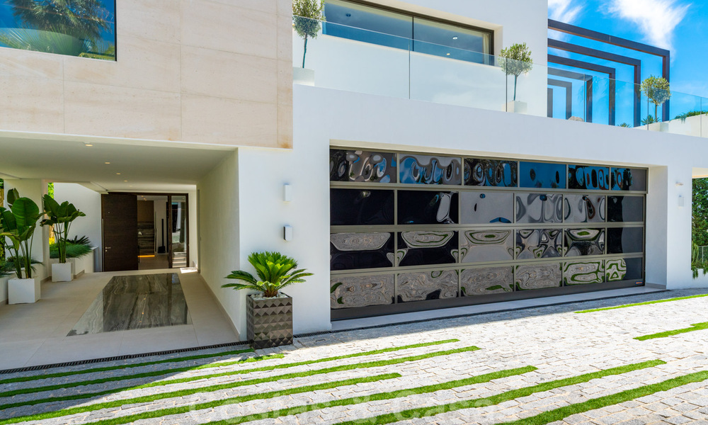 Instapklare, nieuwe moderne villa te koop met zeezicht vanaf ieder niveau in een vijfsterren golfresort in Marbella - Benahavis 35767