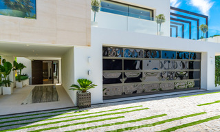 Instapklare, nieuwe moderne villa te koop met zeezicht vanaf ieder niveau in een vijfsterren golfresort in Marbella - Benahavis 35767 
