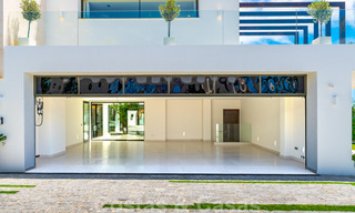 Instapklare, nieuwe moderne villa te koop met zeezicht vanaf ieder niveau in een vijfsterren golfresort in Marbella - Benahavis 35768 
