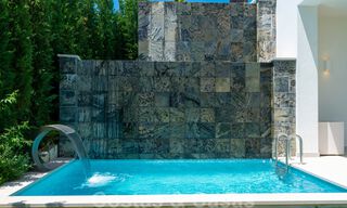 Instapklare, nieuwe moderne villa te koop met zeezicht vanaf ieder niveau in een vijfsterren golfresort in Marbella - Benahavis 35772 