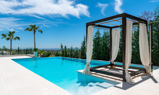 Instapklare, nieuwe moderne villa te koop met zeezicht vanaf ieder niveau in een vijfsterren golfresort in Marbella - Benahavis 35773 