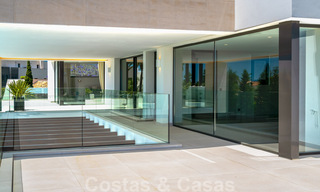 Instapklare, nieuwe moderne villa te koop met zeezicht vanaf ieder niveau in een vijfsterren golfresort in Marbella - Benahavis 35774 