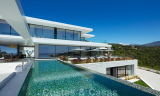 Sensationele nieuwe moderne luxevilla te koop met zeezicht in “gated” El Madroñal in het gebied van Marbella - Benahavis 35904 