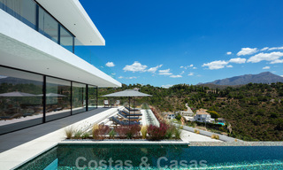 Sensationele nieuwe moderne luxevilla te koop met zeezicht in “gated” El Madroñal in het gebied van Marbella - Benahavis 35906 