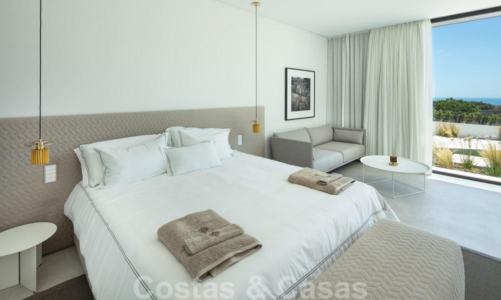 Sensationele nieuwe moderne luxevilla te koop met zeezicht in “gated” El Madroñal in het gebied van Marbella - Benahavis 35907
