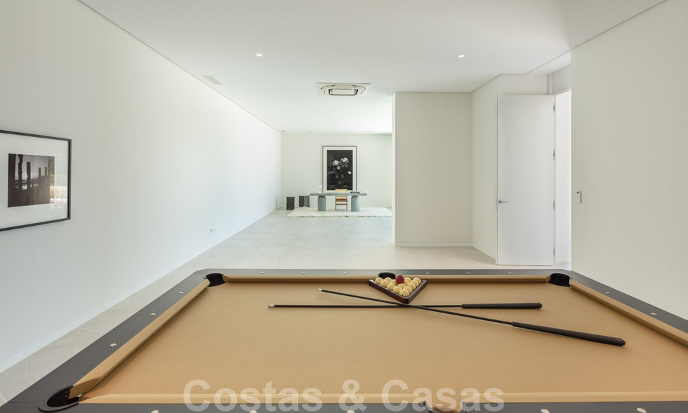 Sensationele nieuwe moderne luxevilla te koop met zeezicht in “gated” El Madroñal in het gebied van Marbella - Benahavis 35909