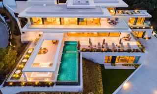 Sensationele nieuwe moderne luxevilla te koop met zeezicht in “gated” El Madroñal in het gebied van Marbella - Benahavis 35933 