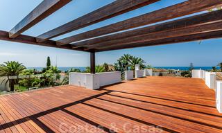 Moderne beachside villa te koop in Marbella-oost met zeezicht op een steenworp van goede en gezellige stranden 36460 