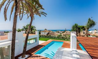 Moderne beachside villa te koop in Marbella-oost met zeezicht op een steenworp van goede en gezellige stranden 36468 