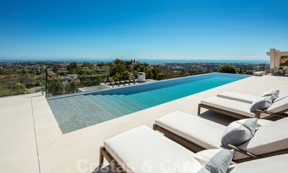 Instapklare, nieuwe luxevilla te koop met panoramisch zeezicht, in een eersteklas golfresort, Benahavis - Marbella 38545