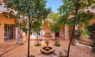 Luxevilla in sfeervolle, Mediterrane bouwstijl te koop met zeezicht in een vijfsterren golfresort in Benahavis - Marbella 39310 
