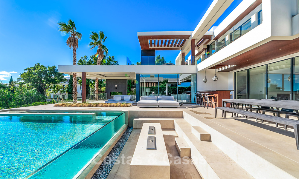 Moderne, architecturale villa met panoramisch zeezicht te koop in een vijfsterren golfresort in Marbella - Benahavis 791729