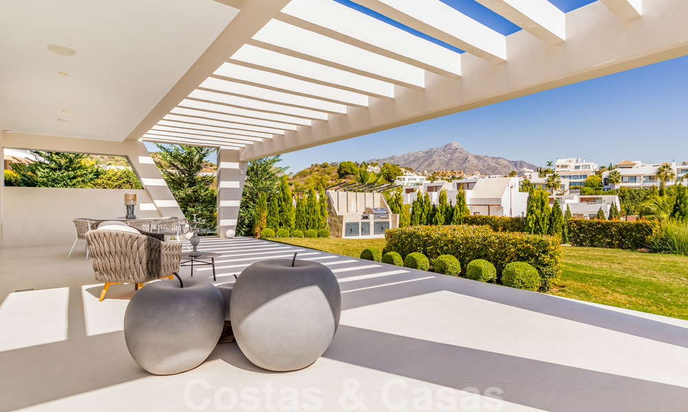 Instapklare, meesterlijke, moderne, hedendaagse villa te koop in Nueva Andalucia, Marbella 39891