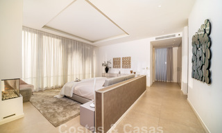 Riante, architecturale villa te koop met spectaculair open zeezicht in een gated community in Benahavis - Marbella 39928 