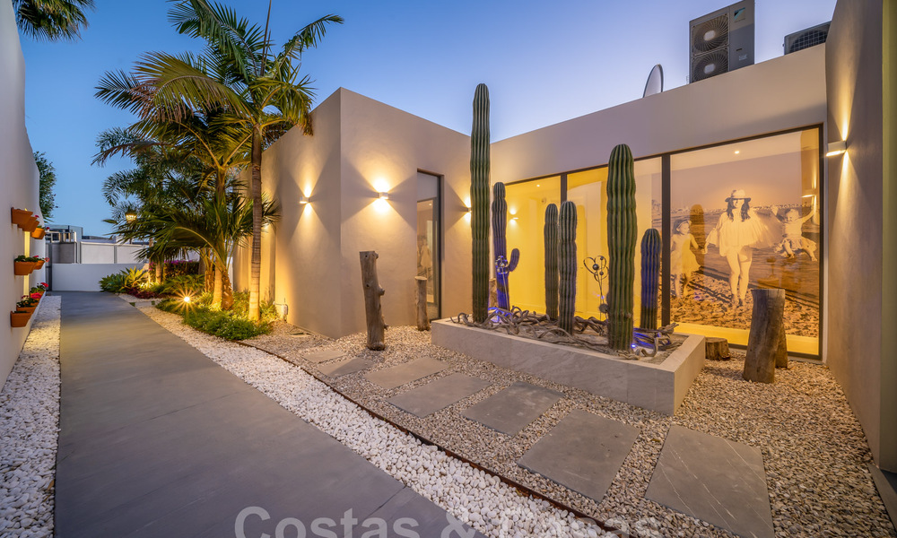 Riante, architecturale villa te koop met spectaculair open zeezicht in een gated community in Benahavis - Marbella 39938