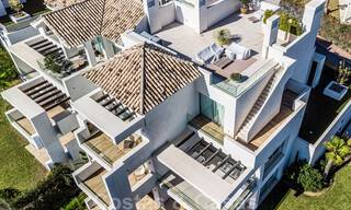 Instapklare, moderne - Andalusische, luxueuze nieuwbouw appartementen te koop met zeezicht in een gated resort in Benahavis - Marbella 40245 