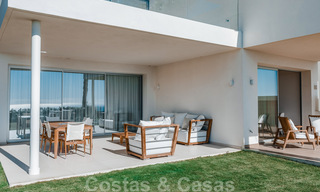 Instapklare, moderne - Andalusische, luxueuze nieuwbouw appartementen te koop met zeezicht in een gated resort in Benahavis - Marbella 40253 