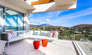 Instapklare, moderne - Andalusische, luxueuze nieuwbouw appartementen te koop met zeezicht in een gated resort in Benahavis - Marbella 40268 