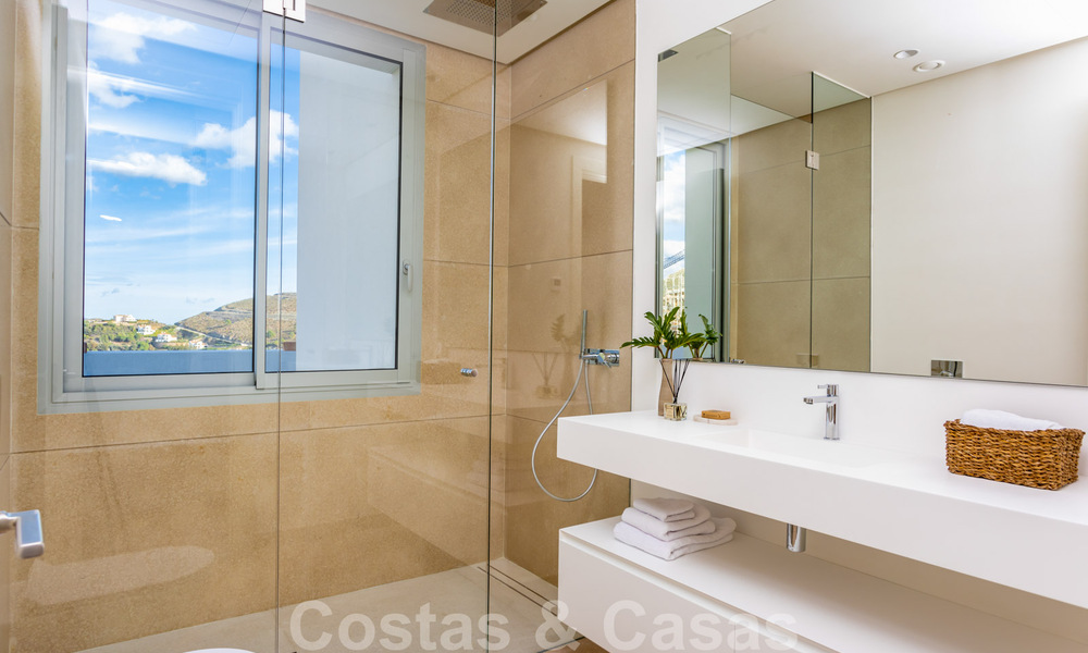 Instapklare, moderne - Andalusische, luxueuze nieuwbouw appartementen te koop met zeezicht in een gated resort in Benahavis - Marbella 40283