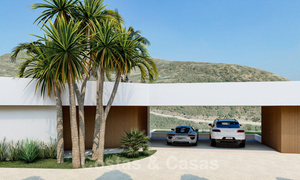 Moderne villa te koop in een natuurlijke omgeving, met panoramisch uitzicht op de vallei en de zee, in een gated resort in Benahavis - Marbella 40507