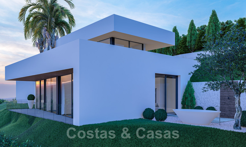 Moderne villa te koop in een natuurlijke omgeving, met panoramisch uitzicht op de vallei en de zee, in een gated resort in Benahavis - Marbella 40510