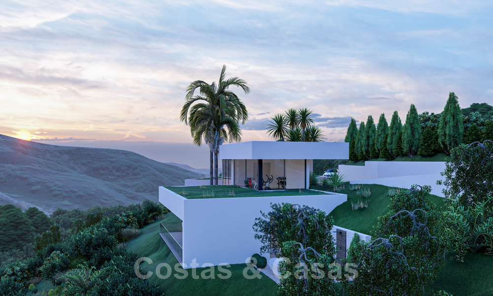 Moderne villa te koop in een natuurlijke omgeving, met panoramisch uitzicht op de vallei en de zee, in een gated resort in Benahavis - Marbella 40516