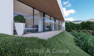 Moderne villa te koop in een natuurlijke omgeving, met panoramisch uitzicht op de vallei en de zee, in een gated resort in Benahavis - Marbella 40518 