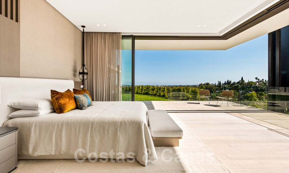 Royale, moderne villa te koop met spectaculair open zeezicht in een gated community in Benahavis - Marbella 40688
