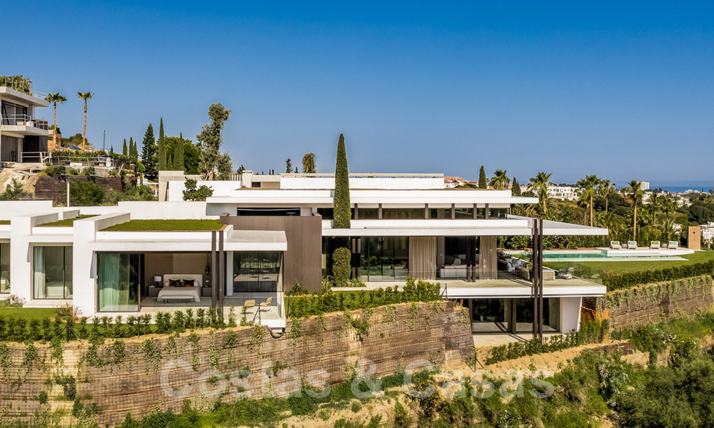 Royale, moderne villa te koop met spectaculair open zeezicht in een gated community in Benahavis - Marbella 40780