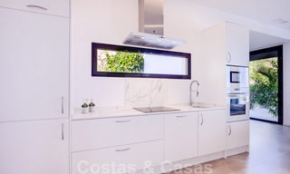 Instapklare, moderne luxevilla te koop met panoramisch berg- en zeezicht in een gated resort in Marbella - Benahavis 41037 