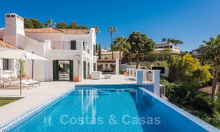 Magnifieke, traditionele, Andalusische luxevilla te koop met panoramisch zeezicht in Benahavis - Marbella 40803 