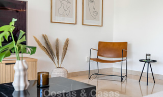 Gerenoveerd, modern appartement te koop met een ruim terras te Nueva Andalucia, Marbella 41352 