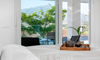 Gerenoveerd, modern appartement te koop met een ruim terras te Nueva Andalucia, Marbella 41368 