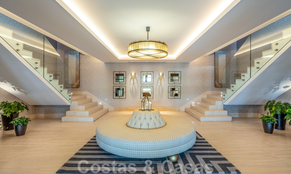 Eigentijdse, moderne luxevilla te koop in resort stijl met panoramisch zeezicht in Cascada de Camojan in Marbella 42117