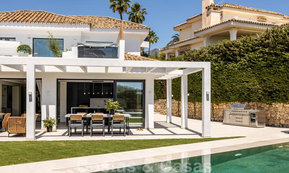 Eigentijdse mediterrane luxevilla te koop met uitzicht op de golfvallei in Nueva Andalucia - Marbella 42802