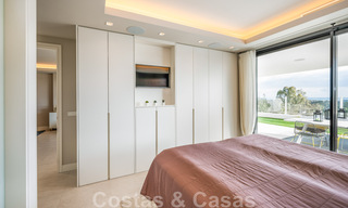 Hoogwaardig, modern tuinappartement te koop met 3 slaapkamers en panoramisch zeezicht in het hartje van Nueva Andalucia te Marbella 42866 
