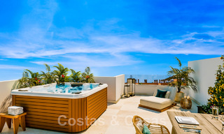 Nieuwe, eigentijdse, rijwoningen te koop met adembenemend zeezicht in Manilva aan de Costa del Sol 43331 