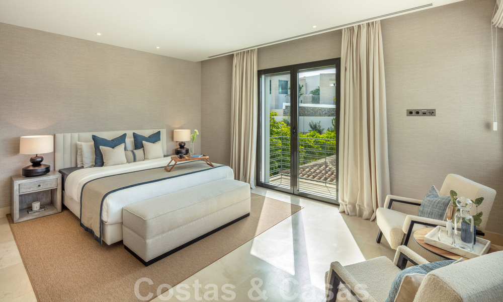 Uitmuntende luxevilla te koop in een moderne, Mediterrane architectuur, met zeezicht en in een golfresort in Benahavis - Marbella 44156