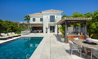 Uitmuntende luxevilla te koop in een moderne, Mediterrane architectuur, met zeezicht en in een golfresort in Benahavis - Marbella 44175 